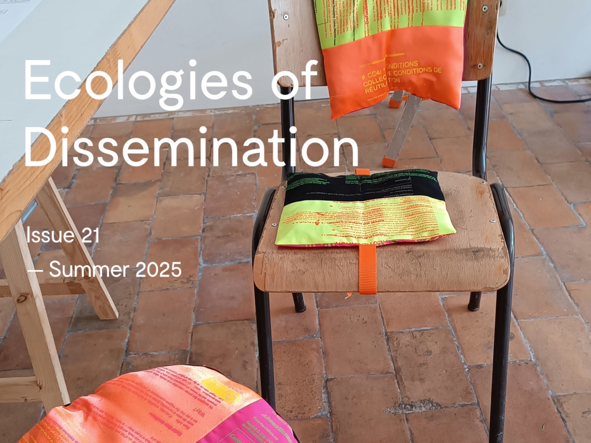 A stool and a chair, with colourful cushions attached to them, next to a table on a brick floor. Each cushion is screen-printed with text fragments.